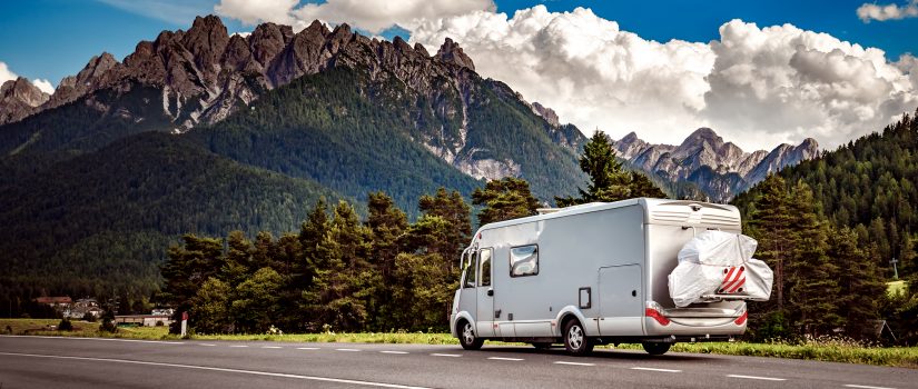 Family vacation travel, holiday trip in motorhome, Caravan car Vacation. Beautiful Nature Italy natural landscape Alps.